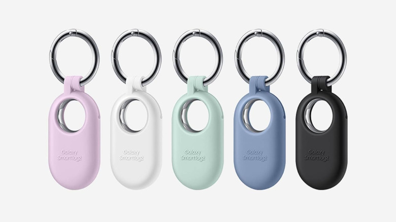 Several Samsung Galaxy SmartTag2s attached to keychains against a white background