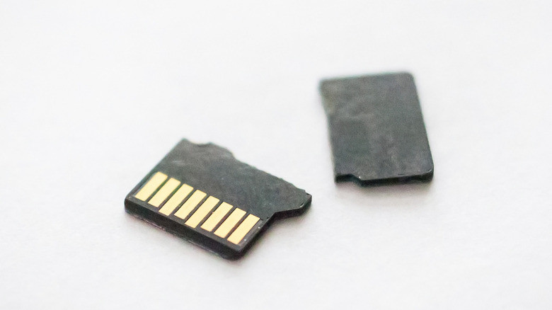 Close up of a Micro SD card snapped in half.