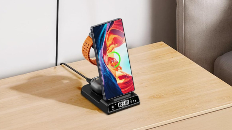 The Phelinta 3-in-1 Wireless Charging Station charging a Samsung phone, watch and earbuds