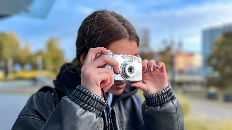 Looking through the viewfinder of a point and shoot camera