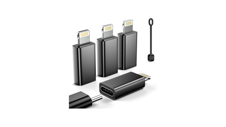 Several USB-C to Lightning adapters on white background