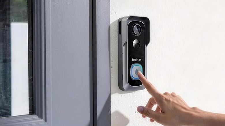 A person ringing the Boifun Wireless Video Doorbell