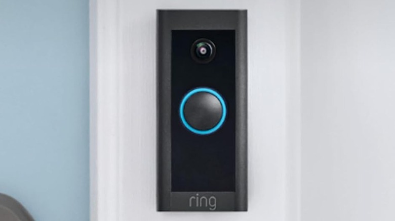 The Ring Video Doorbell Wired mounted outside a front door.