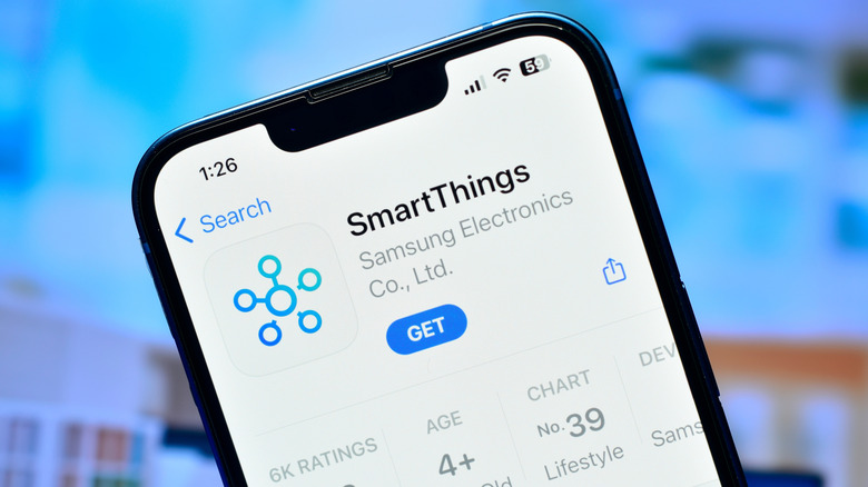 An iPhone showing the Samsung SmartThings app listing page on App Store