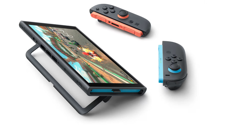 A Nintendo Switch 2 on a white background with the Joy Con detached, and angled so the kickstand is towards the viewer