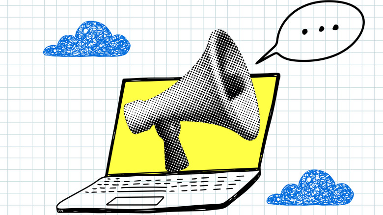 A laptop with a loudspeaker icon on it