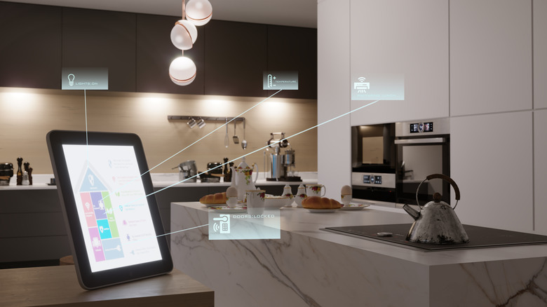 Tablet connected to multiple smart home devices in a kitchen