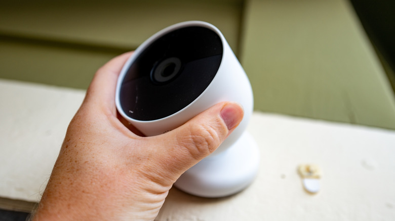 Google Nest Camera held in hand