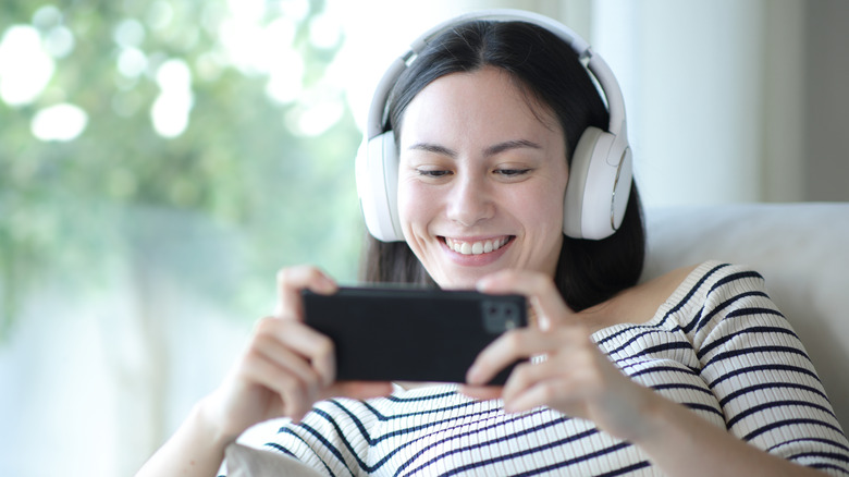A young woman using a smartphone.