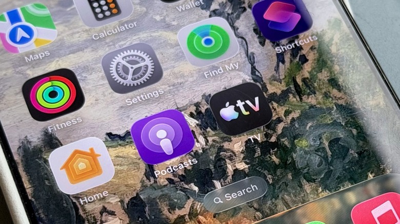 An iPhone home screen with several apps Apple TV, Apple Fitness, and several apps shown