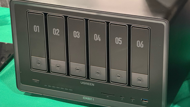 UGreen Ai NAS server on green table