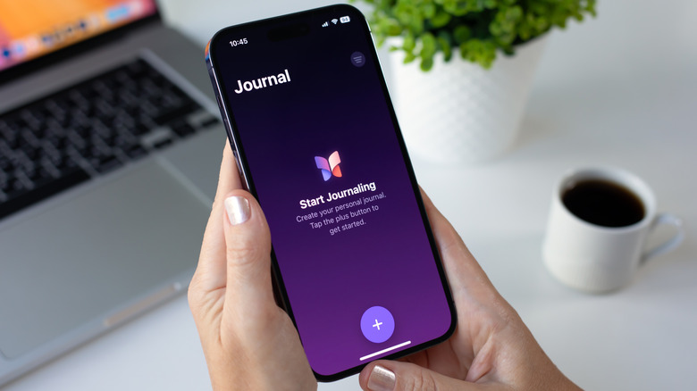 An iPhone displaying the Journal app