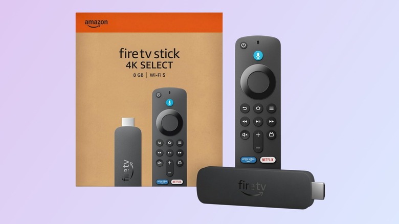 Amazon Fire TV Stick 4K Select next to its packaging against a lavender background.