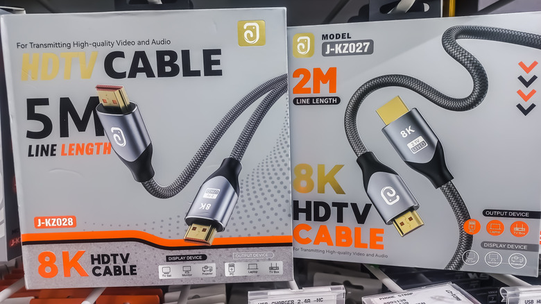 Boxes of 8K HDMI cables in a store