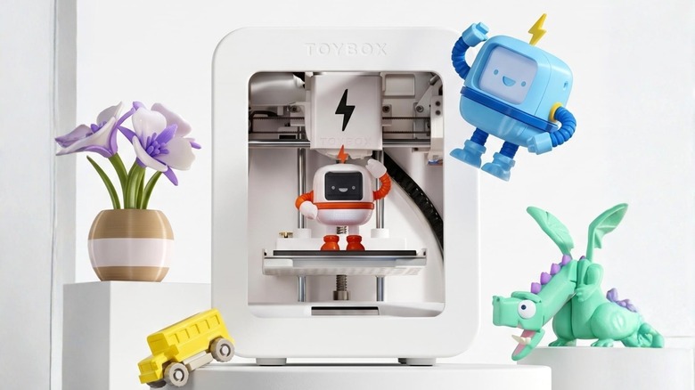 Toybox 3D printer with several multicolor projects on display