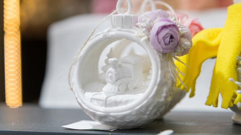 A 3D printed ornament resting on a table.