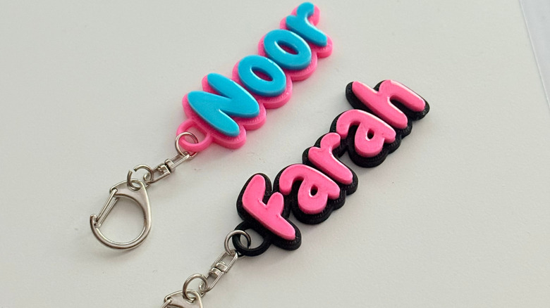 A 3D keychain with unique names visible in different colors.