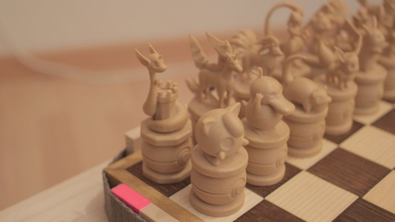 Statues of several Pokémon characters from a chess set