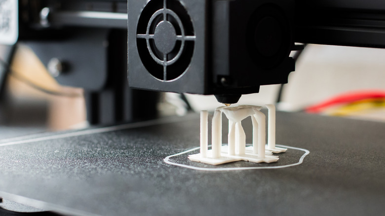 Close up of a 3D-printed model with potential supports visible.