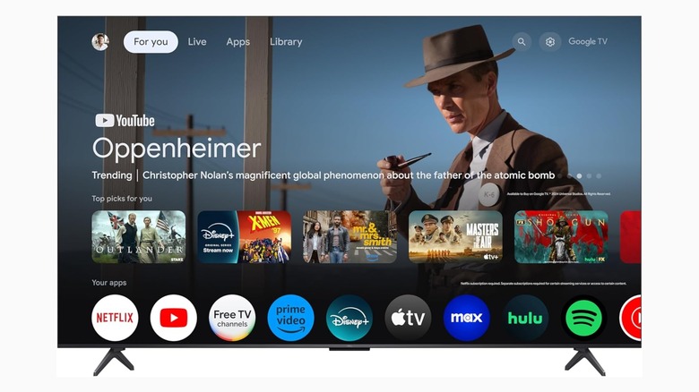 An Amazon promotional image for the TCL Class QM6K Series QLED 4K, the TV displays the home screen for the device's operating system