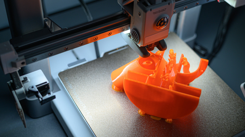 3D printer in the process of creating intricate design