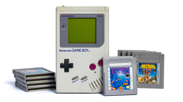 Close-up of Nintendo Game Boy with game cartridges