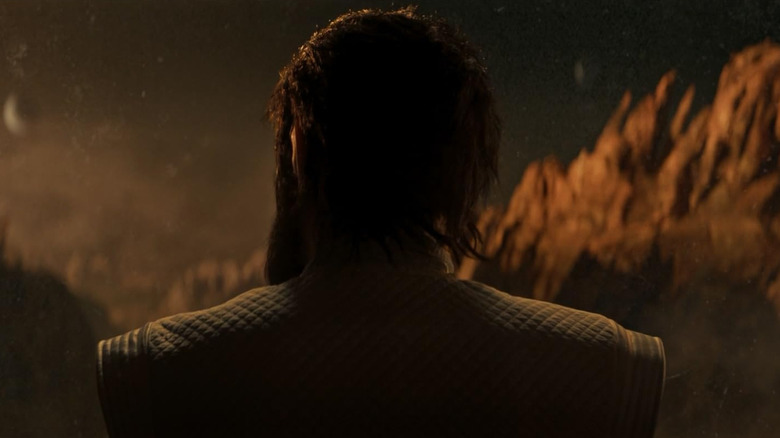 Sybok teased as he looks on with his back to the camera