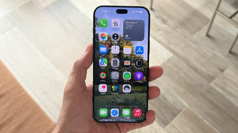 A hand holding the iPhone 18 Pro Max