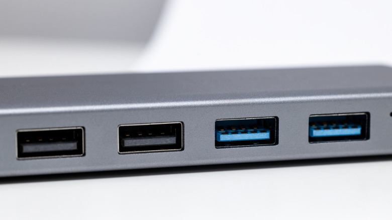 A four-port USB hub on a table.