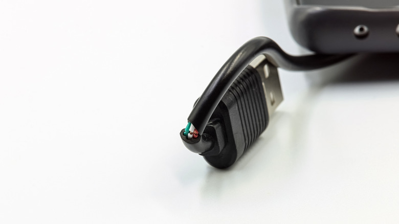 A frayed, damaged USB cable.
