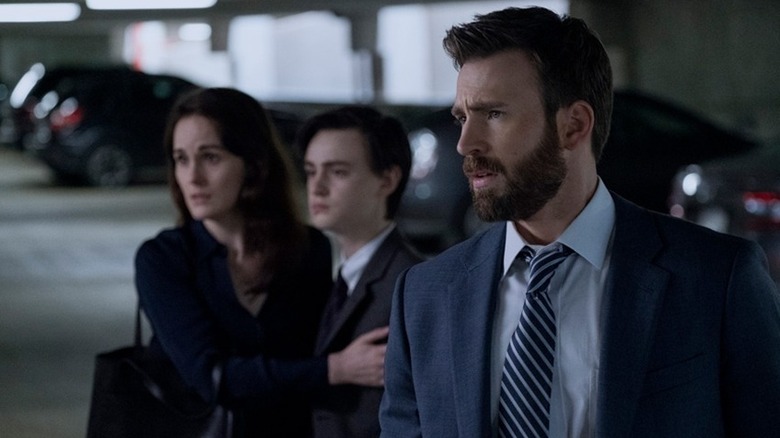 Andy, Laurie, and Jacob Barber looking worried and upset