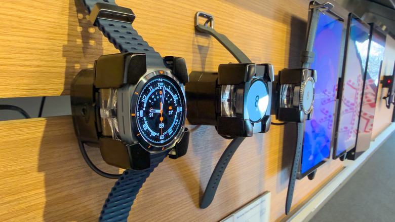 Samsung Galaxy smartwatches in a wall display of a store
