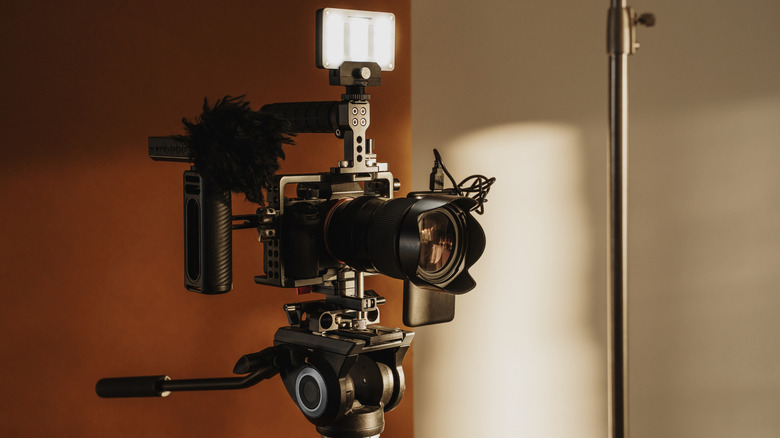 Mirrorless camera mounted on a professional video rig.