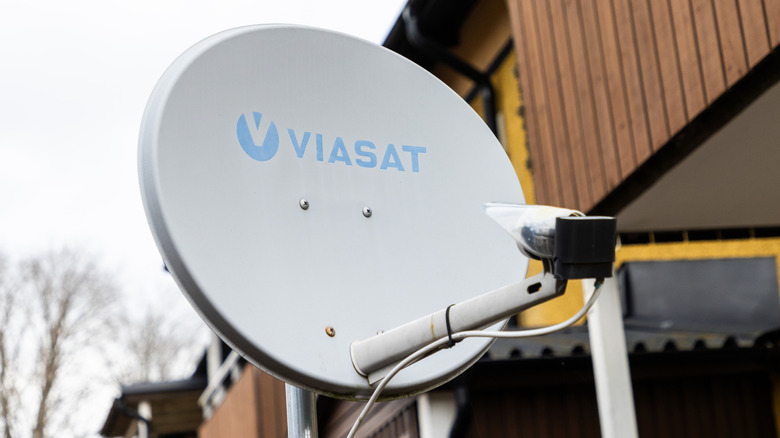 Viasat satellite dish mounted outside a building.