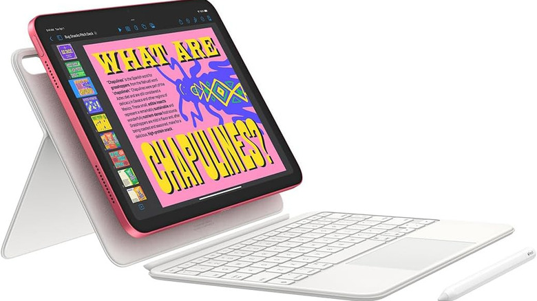 Apple iPad A16 shown with a keyboard case and stylus on a white background.