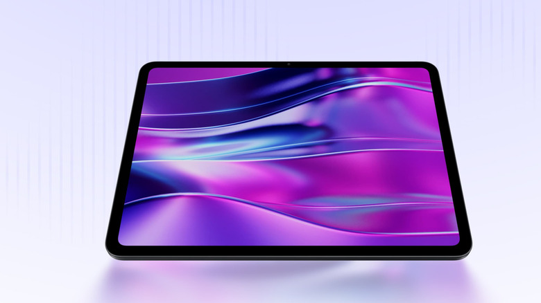 OnePlus Pad Go 2 tablet with a purple abstract wallpaper on a light background.