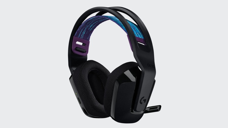A pair of black Logitech G535 Lightspeed wireless headphones sitting against a gray background