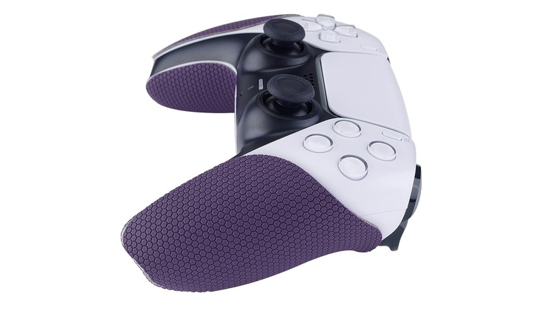 close-up of PlayVital eXtremeRate anti-skid grips on a DualSense controller