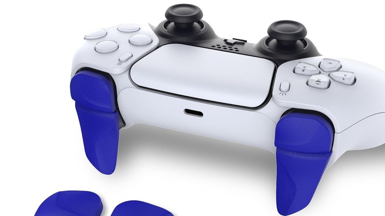 PlayVital shoulder button extension triggers installed on a DualSense controller in blue