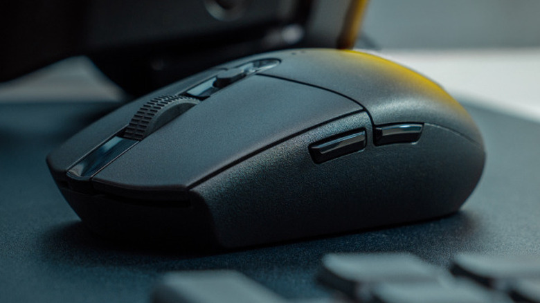 The Logitech G305 Lightspeed wireless gaming mouse on a desk.