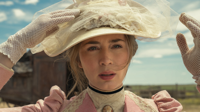 Lady Cornelia Locke adjusting hat in the open plains in The English (2022)