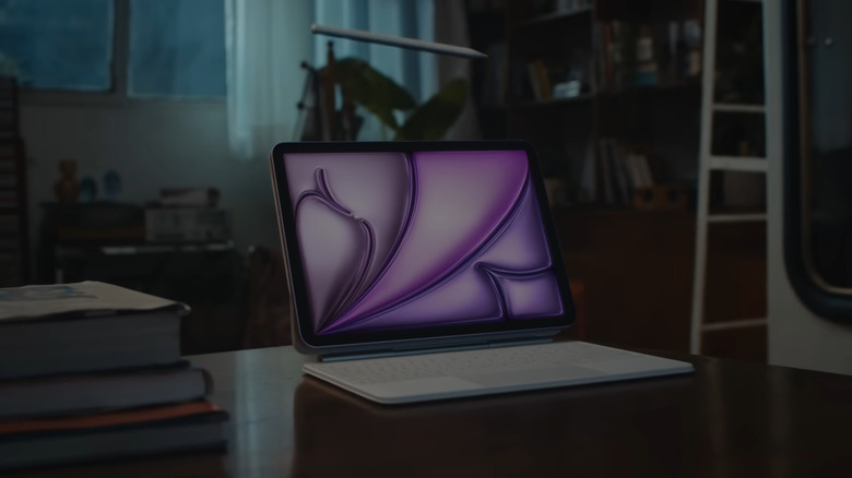 iPad on table with Apple Pencil and keyboard