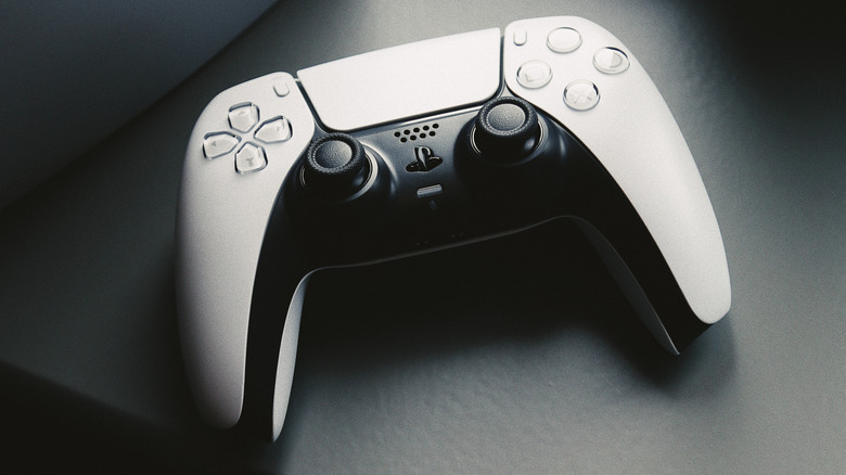 Close up of the PS5 DualSense wireless controller in white.