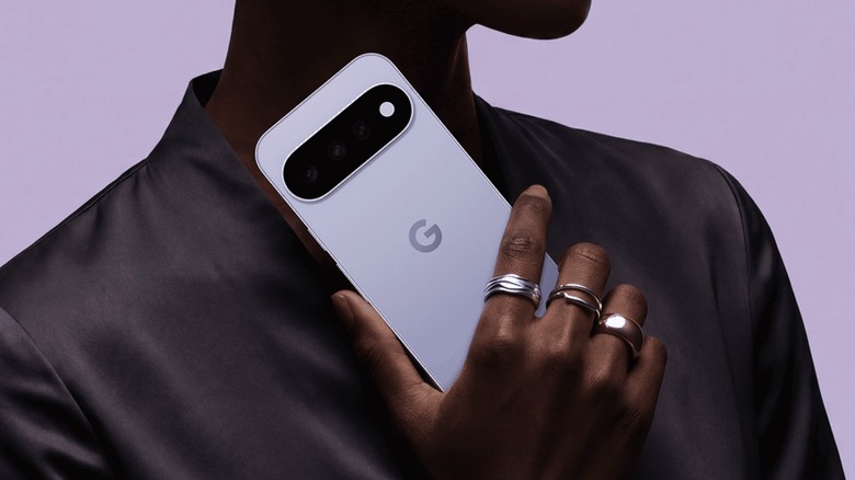 The Pixel 11 in hand.