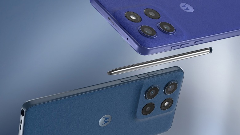 Two Motorola Moto G Stylus (2025) with a stylus in between