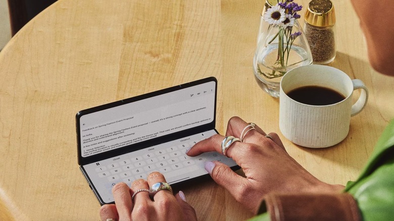 A person using the Motorola Razr Fold foldable.