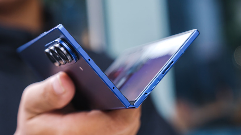 A half-folded Samsung Galaxy Z Fold 7 resting in someone's hand