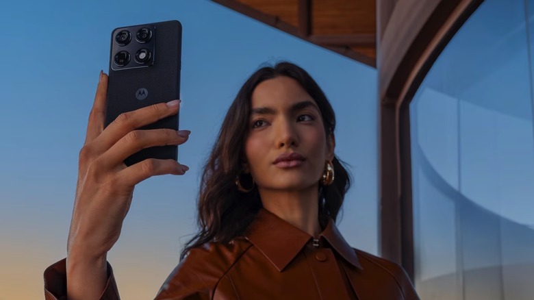 A person taking photos with the Motorola Signature.