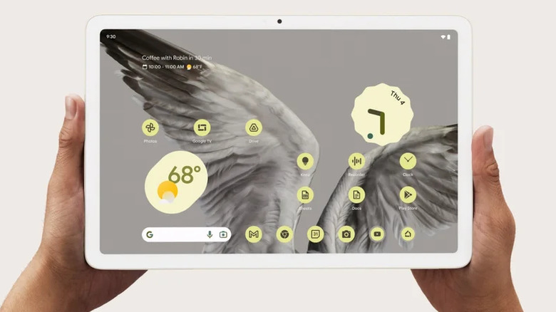 Person holding a Google Pixel Tablet