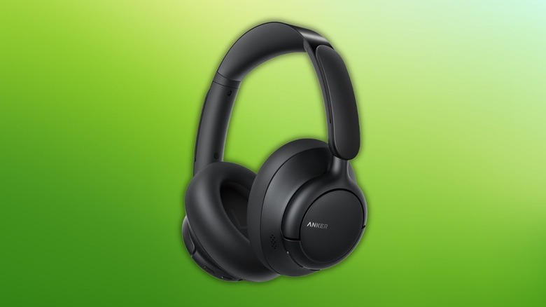Soundcore Q31i ANC Headset on a green gradient background